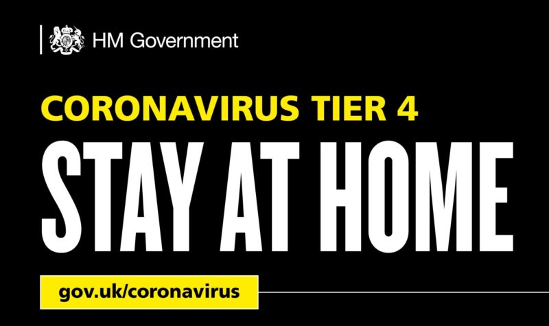 HM Government banner which reads: "Coronavirus Tier 4. STAY AT HOME. gov.uk/coronavirus"